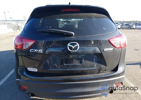 2013 Mazda Cx-5 Touring z USA, uszkodzony, nr VIN JM3KE2CE1D0145977